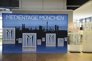 Plakatwand der Medientage München